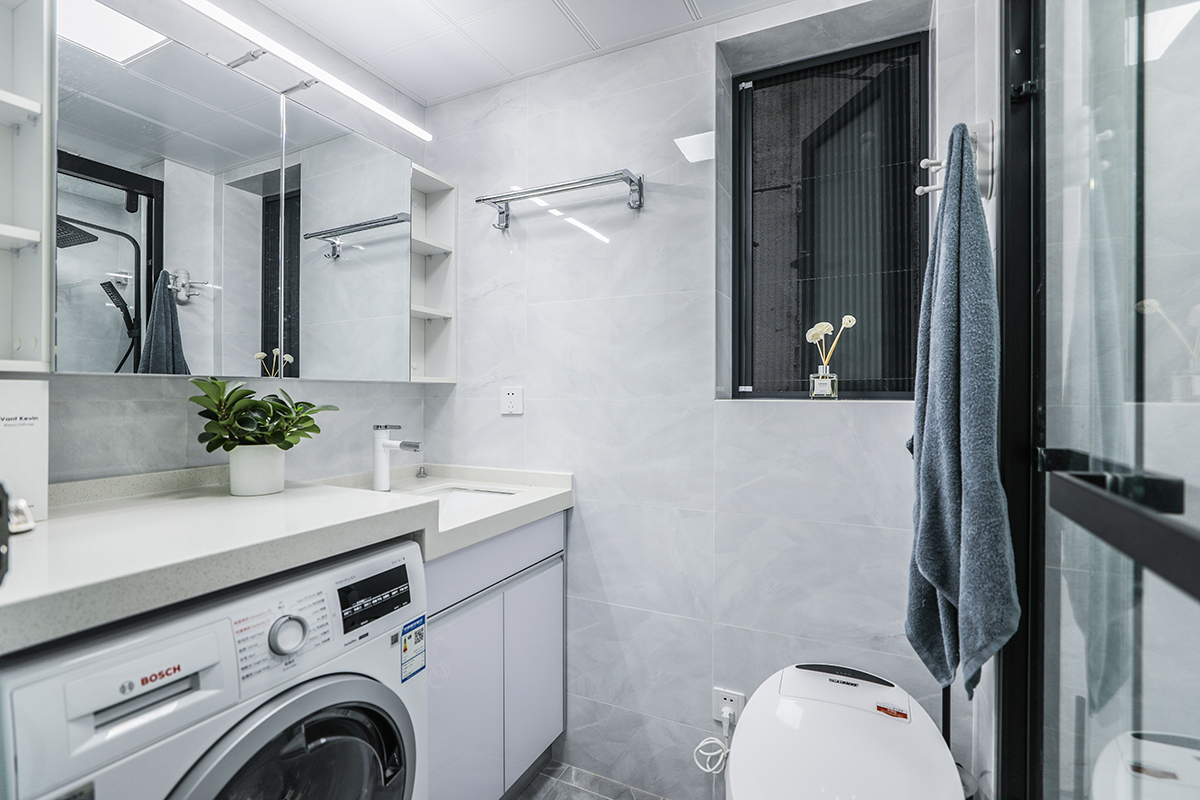 隨著社會的不斷發展，完美的開放式廚房吧臺設計實現了即美觀而又不失實用的功能作用既可以當做小餐桌，又可以聊天看書。這樣的設計可以多容納幾個人的存在，坐在高腳吧椅上喝著酒、聊著天，何不是一種生活享受呢